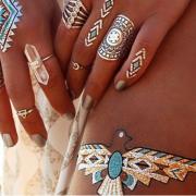 I nuovi tatuaggi oro saranno il must dell'estate
