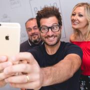 Enrico Papi ospite di RMC: le foto più belle