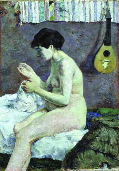 Nudo di donna che cuce