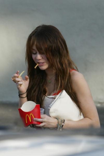 Miley Cyrus gets a Mickey Dees fry attack after church!